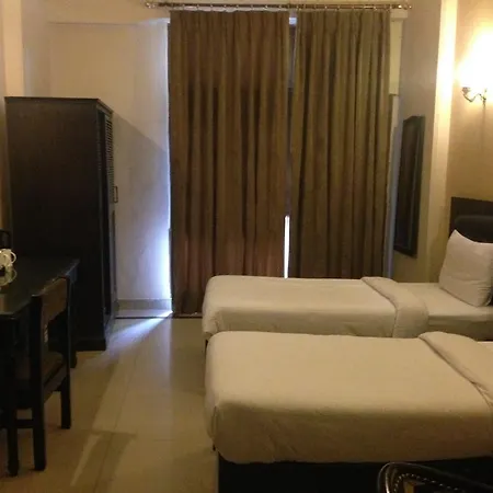 Fabhotel Happy Residency